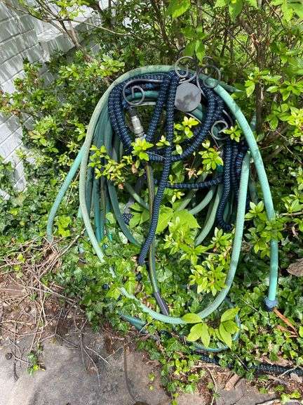 All garden hoses and stand ( in front of house & back)