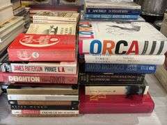 Paperback and hardcover books,  leisure reading