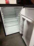 Magic chef refrigerator ( working condition unknown, but in good shape) in basement box of plastic ware
