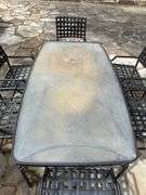 Brown Jordan patio table with lexan top and 6 chairs