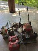Troy-bilt  push mower, 2 gas powered blowers 2 plastic gas cans