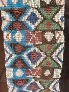 Framed beaded sash, (broken glass) 7” x 36”