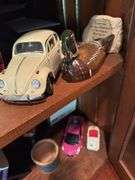 Model cars, wooden duck