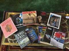 Lot of hard back books and magazines