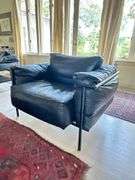 Pair of Montis black leather and tubular metal chairs in the manner of Le Corbusier LC3 armchair, excellent vintage condition