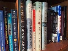 Shelf of hardback books