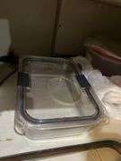Ceramic platter, plastic containers, Cuisinart salt and pepper mills, Brita water pitcher, miscellaneous