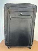 Large rolling suitcase, 2 bag chairs, 2 camping candle stoves/warmers