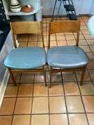 Pair of padded leather seat chairs
