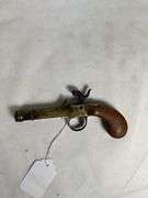 antique brass black powder pistol