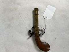 antique brass black powder pistol