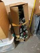 7 boxes of Christmas items. In basement