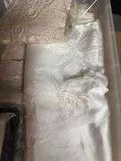 1 box & 1 tub of  queen size comforter and  tablecloths and lace
