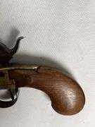 antique brass black powder pistol