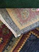 Hand knotted wool rug (missing some edging) 58” x 77”