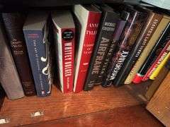 2 shelves of books mostly medical
