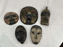 Group of Five Carved Tribal-Style Masks
