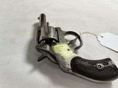 The American  32  Double Action  6877