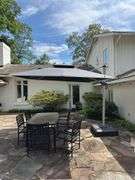 Offset patio umbrella approximately 9ft