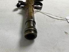 antique brass black powder pistol