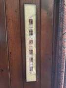Beaded belt in frame
