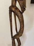 Primitive African wood carved 56” h statue