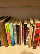 Bottom shelf of books