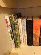Bottom shelf of books
