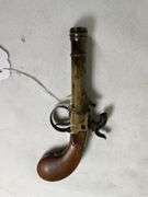 antique brass black powder pistol