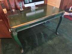 Antique Louis XIV style dark green desk with gilt painted accents, one drawer