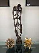Hand-Carved Abstract Couple Sculpture with Decorative Accents