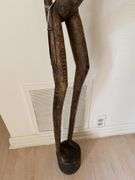 Primitive African wood carved 56” h statue