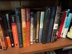 2 shelves of books mostly medical