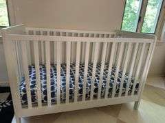 Crate and Kids white baby crib with mattress/ sheet. 54” l X 30” w