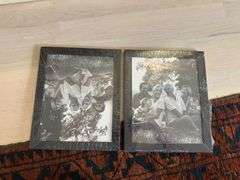 Decorative box on wire base, candle with base, black photo frames, books