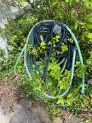 All garden hoses and stand ( in front of house & back)