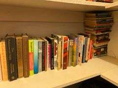 Bottom shelf of books