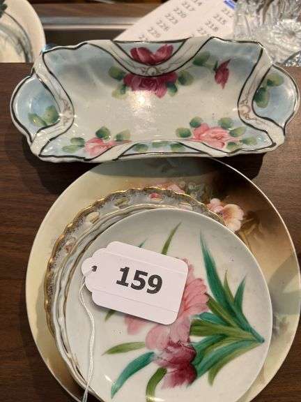 Hand painted porcelain plates, saucers, bone dishes