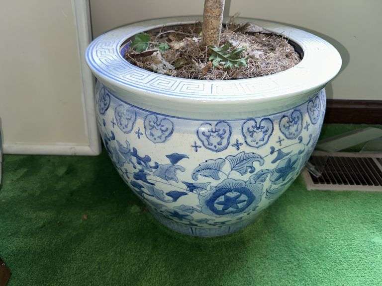 Blue and white planter with artificial ficus tree 6’ tall