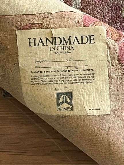Women 100% wool pile area rug