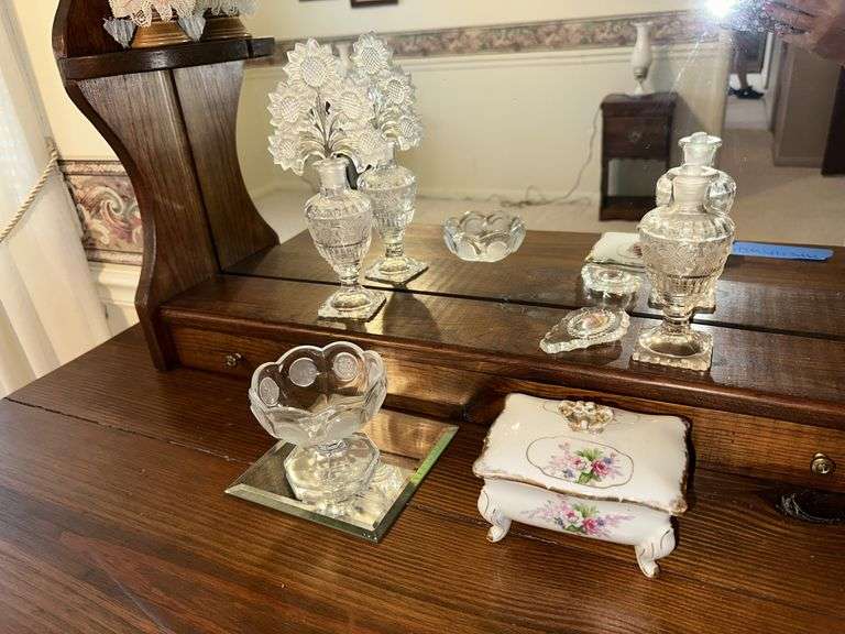 Porcelain dresser box, 2 perfume bottles (one has broken stopper), brass bell, 2 china bells, candle