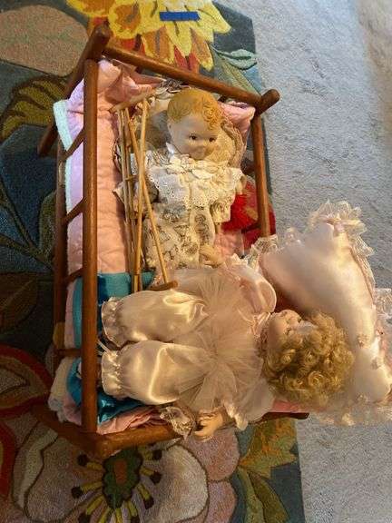 Vintage dolls and crib image