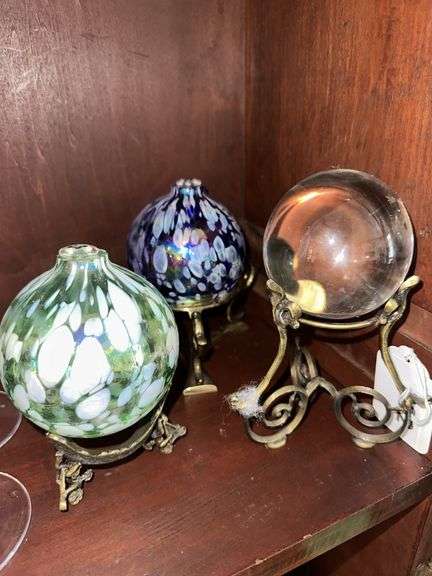 Blown glass candle holders, brass stands, clear glass ball image