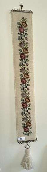 Antique bell pull with cross stitch, ornate framed mirror