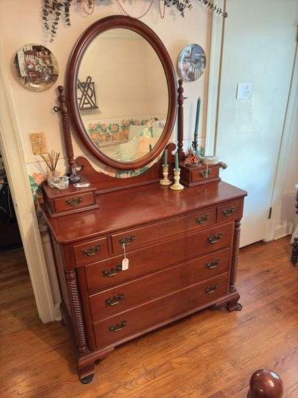 Willett Cherry dresser w/ oval mirror, twisted column’s & brass pull; excludes contents image