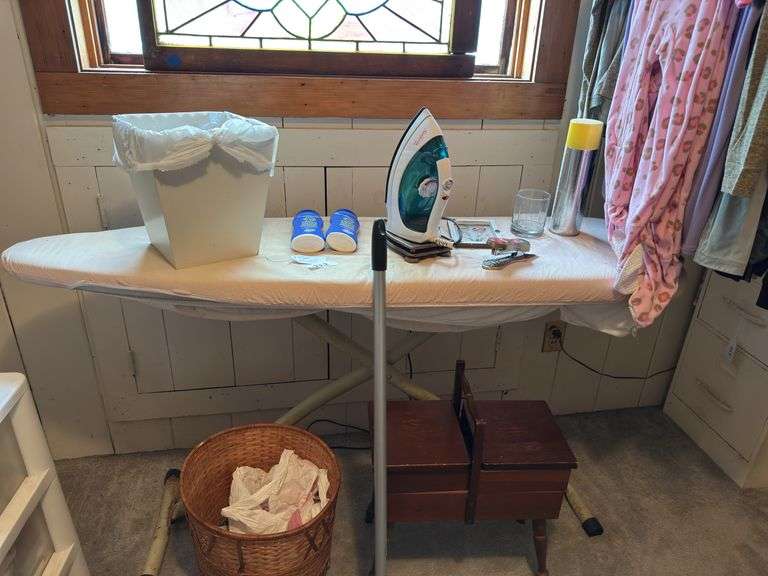 Ironing board, iron, dust mop,  antique wood sewing box, wicker basket image