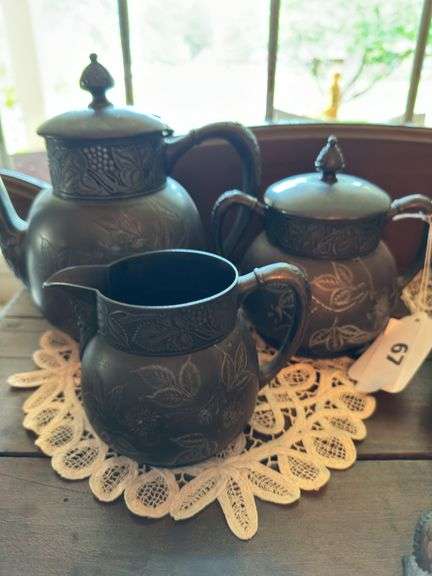 Quadruple plate teapot, sugar & creamer, brass bowl, metal clamshell,miniature pewter baby & dog& miniature eagle image