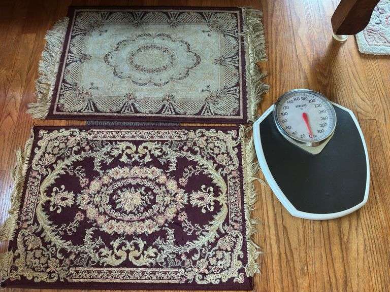 2 small rugs 24” x 30” and scale image