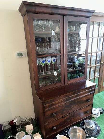 2 piece Antique walnut step back cabinet with wavy glass doors