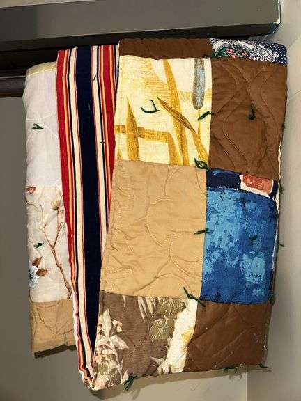 Lot of candles, bedspread with pillows, quilt